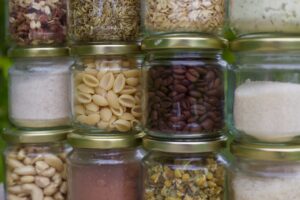 A variety of clear food storage containers organized in a kitchen, showcasing effective food storage solutions.
